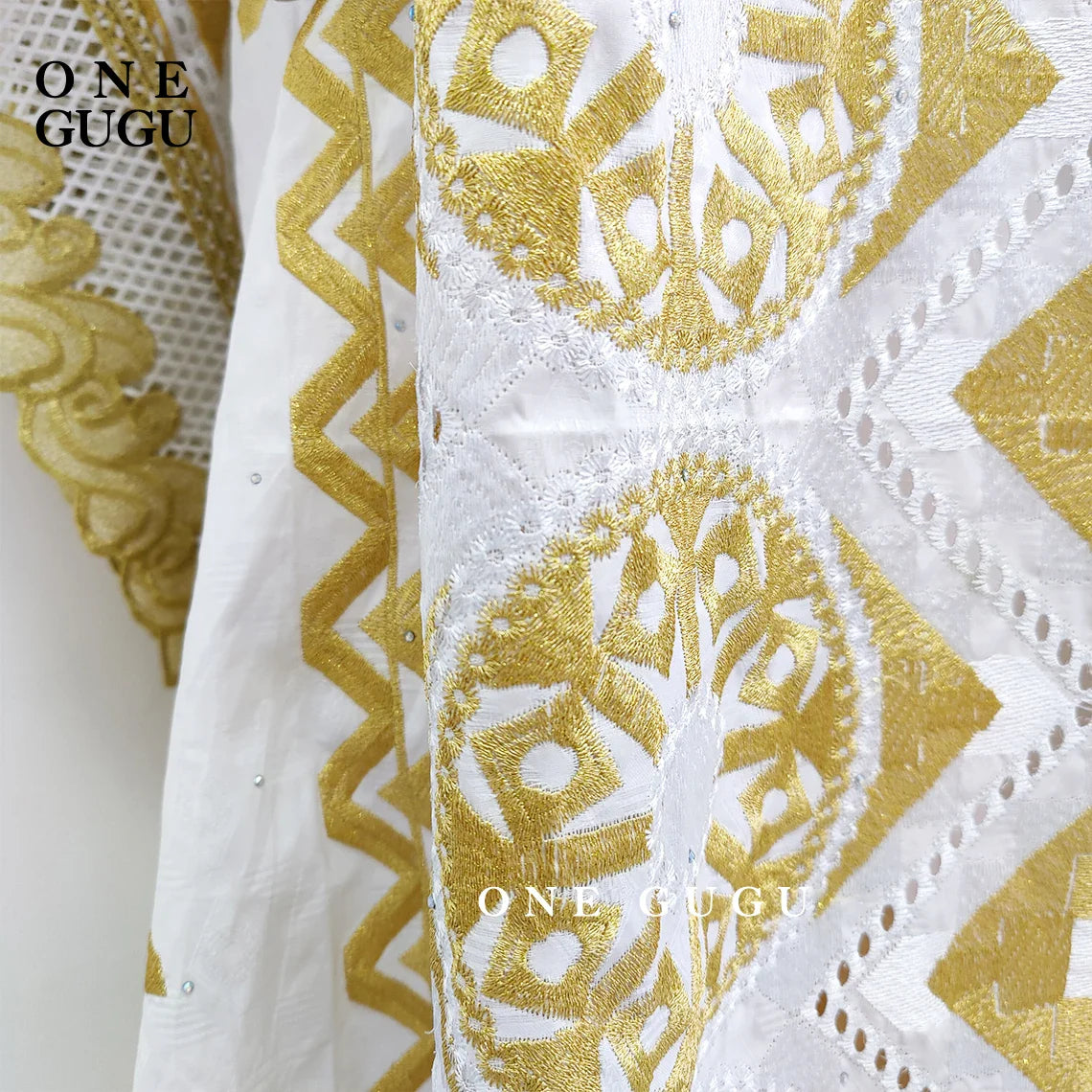 Detail of the pullover neckline and unique lace decoration on the Original Nigerian Bazin Dress Dashiki, illustrating the blend of traditional African attire with modern luxury.