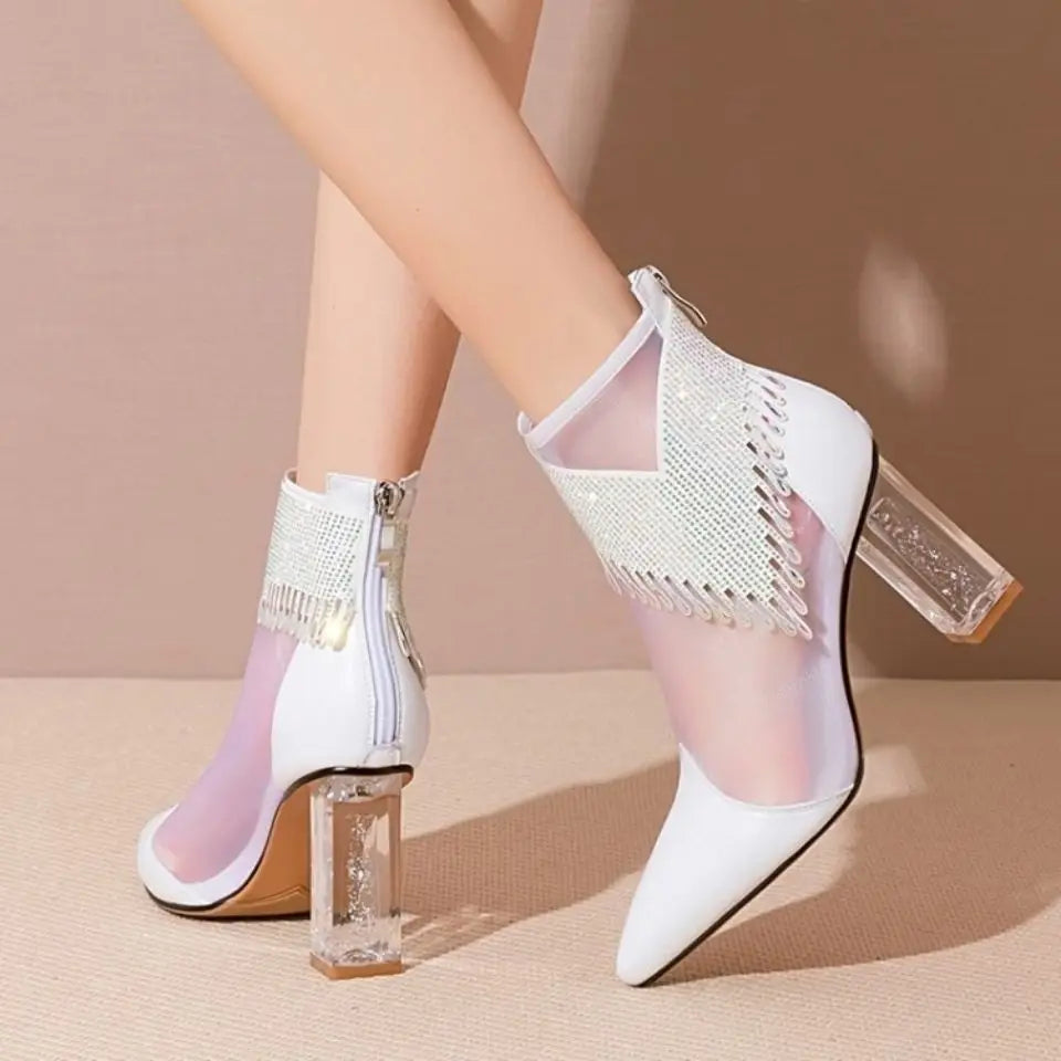 Chic high heel dance boots for women adorned with glamorous rhinestones and tassels, designed with a comfortable rubber sole and stylish lace-up mesh.
