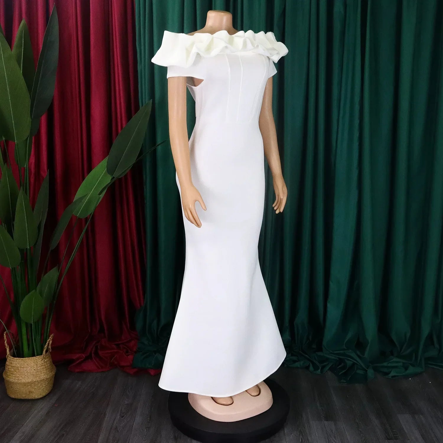 Elegant off shoulder mermaid dress in solid colour, showcasing a chic floor-length design and short sleeves, perfect for glamorous club outings.