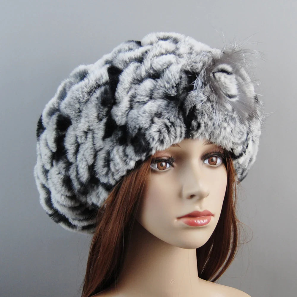 Stylish women's winter hat and scarf set in luxurious faux fur, perfect for adding elegance to any cold-weather outfit.