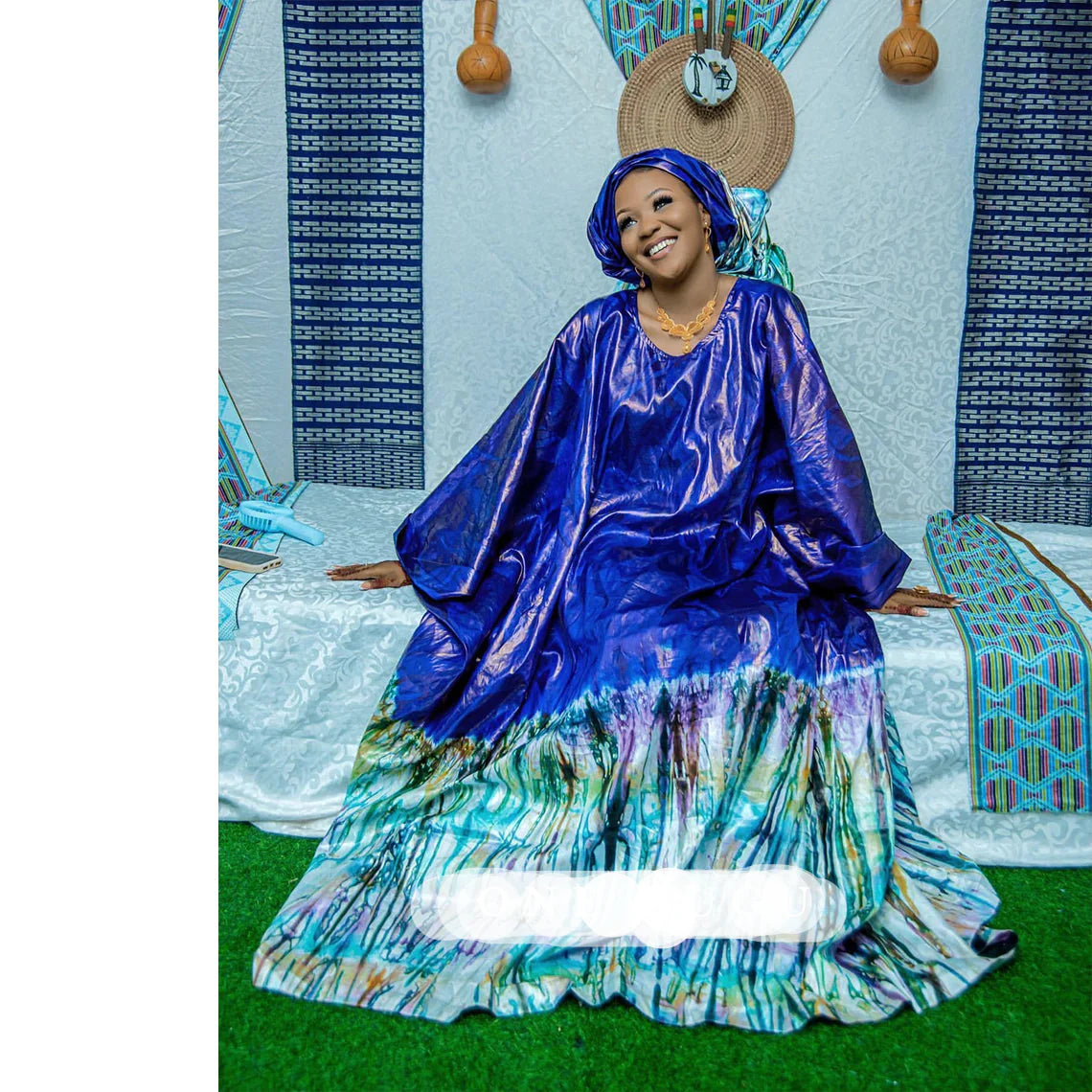 Luxury African Dashiki Bubu Dress in rich blue cotton with elegant embroidery lace detail, showcasing traditional African fashion.