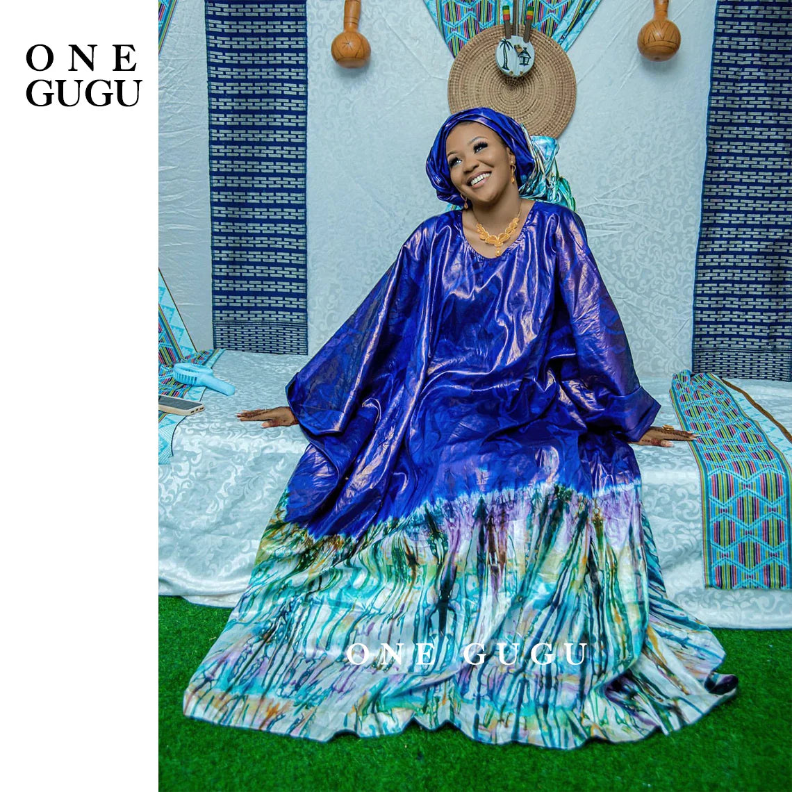 Chic and versatile one-size Premium Nigerian Bazin Riche gown, adorned with delicate embroidery and perfect for various occasions.