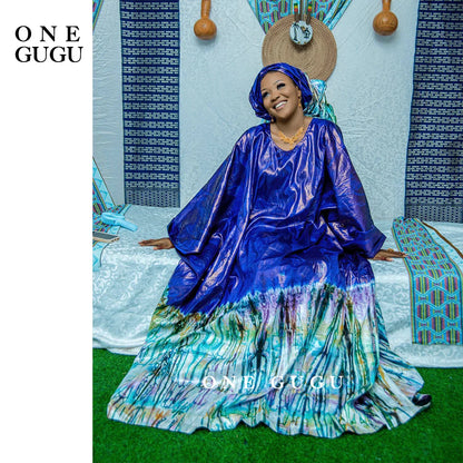 Chic and versatile one-size Premium Nigerian Bazin Riche gown, adorned with delicate embroidery and perfect for various occasions.