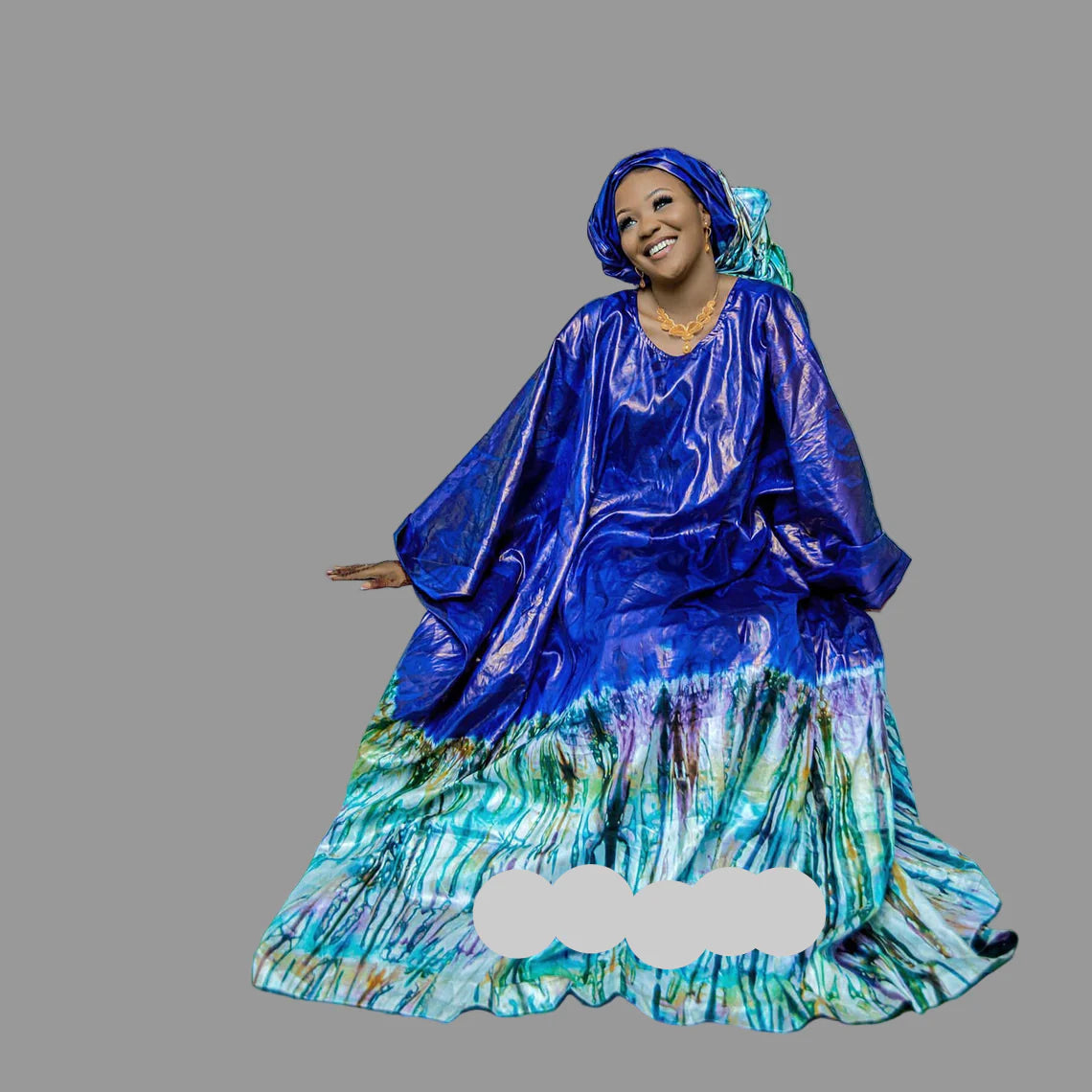 Elegant close-up of the luxurious embroidery lace and stones detailing on the African Dashiki Boubou Gown, showcasing intricate craftsmanship and vibrant colours.