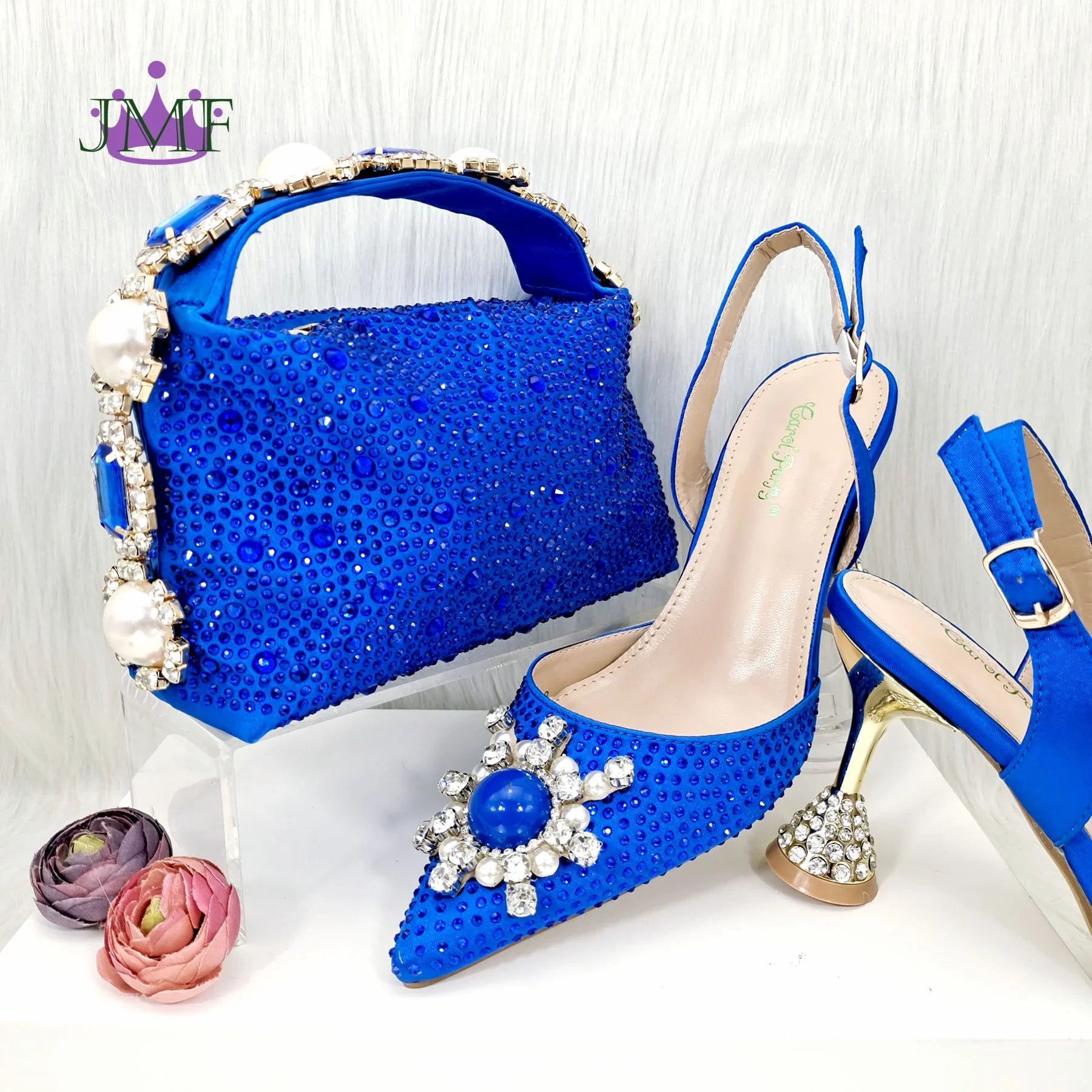 Elegant Italian design blue women's stiletto heels with luxurious rhinestones and pearls, perfect for upscale events.
