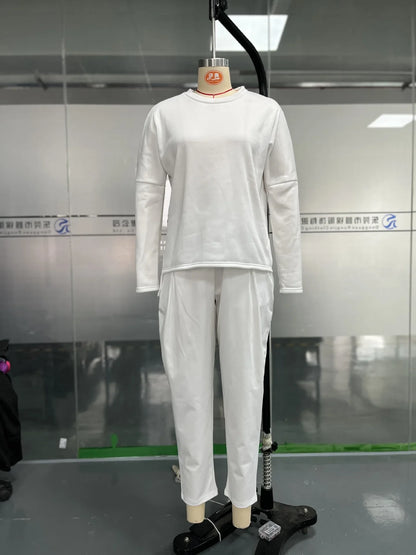 Elegant and casual women's ensemble featuring a full-sleeve top and midi waist long pants, crafted from premium cotton linen for a refined autumn/winter look.