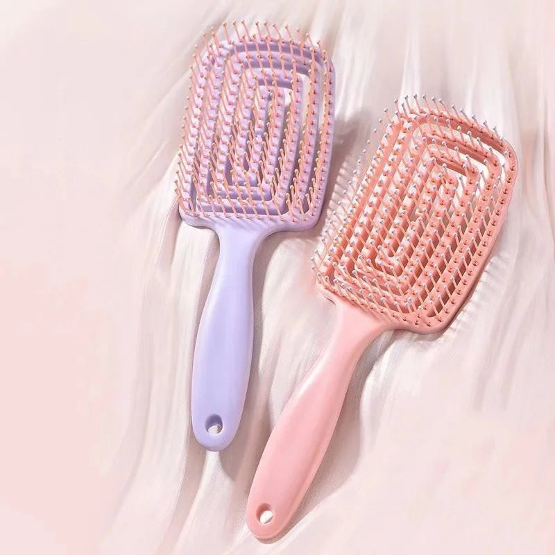 Luxurious Elastic Hollow Out Massage Comb designed for effortless hair styling and gentle scalp massage.