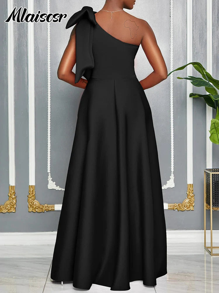 Elegant Mlaiscsr one-shoulder evening dress displayed on a mannequin, highlighting the chic loose fit and intricate bow decoration for a refined look.