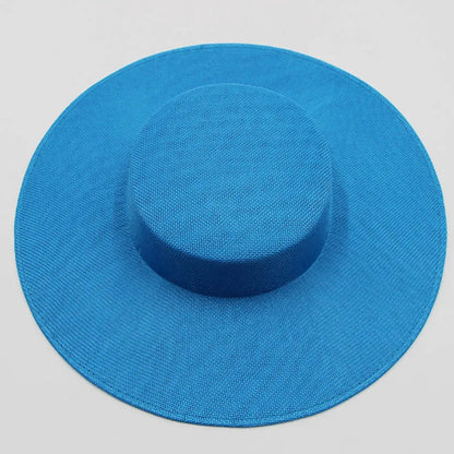 Exquisite sinamay fascinator hat showcasing vibrant colours and deluxe craftsmanship, suitable for enhancing wedding and party attire.