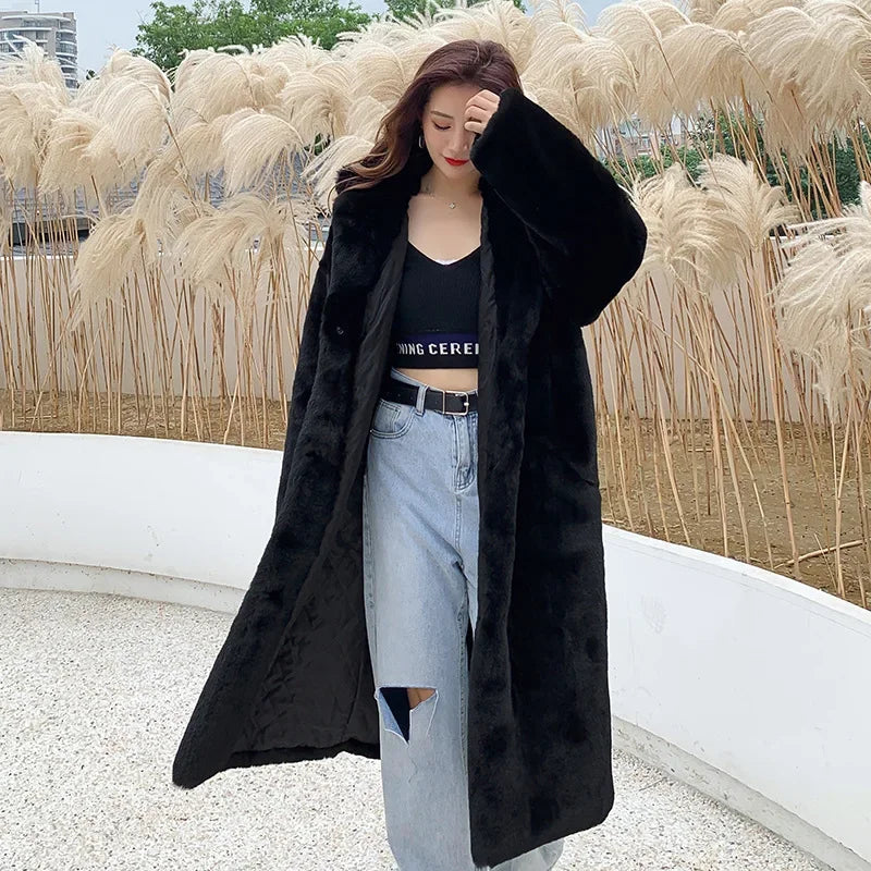 Stylish women’s faux fur maxi coat showcasing sophisticated vintage aesthetics and tatting craftsmanship.