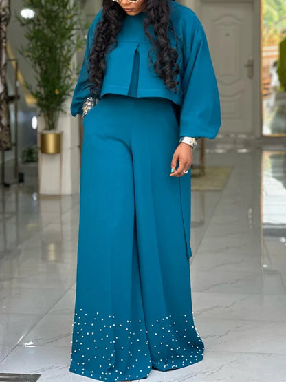 Stylish wide-leg trousers designed with a high waist, elegant for women, perfect for office and evening events as part of an exquisite outfit set.