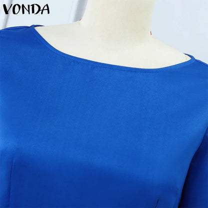 A stylish woman wearing VONDA's plus size bohemian maxi dress, highlighting the loose fit and ankle-length design suitable for various occasions.