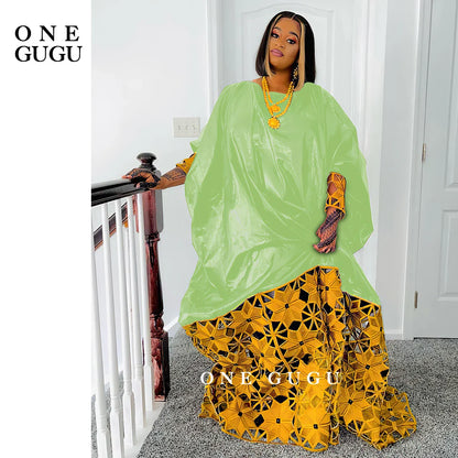 Fashionable African-inspired dress robe for women, combining traditional elements with contemporary elegance for a timeless look.