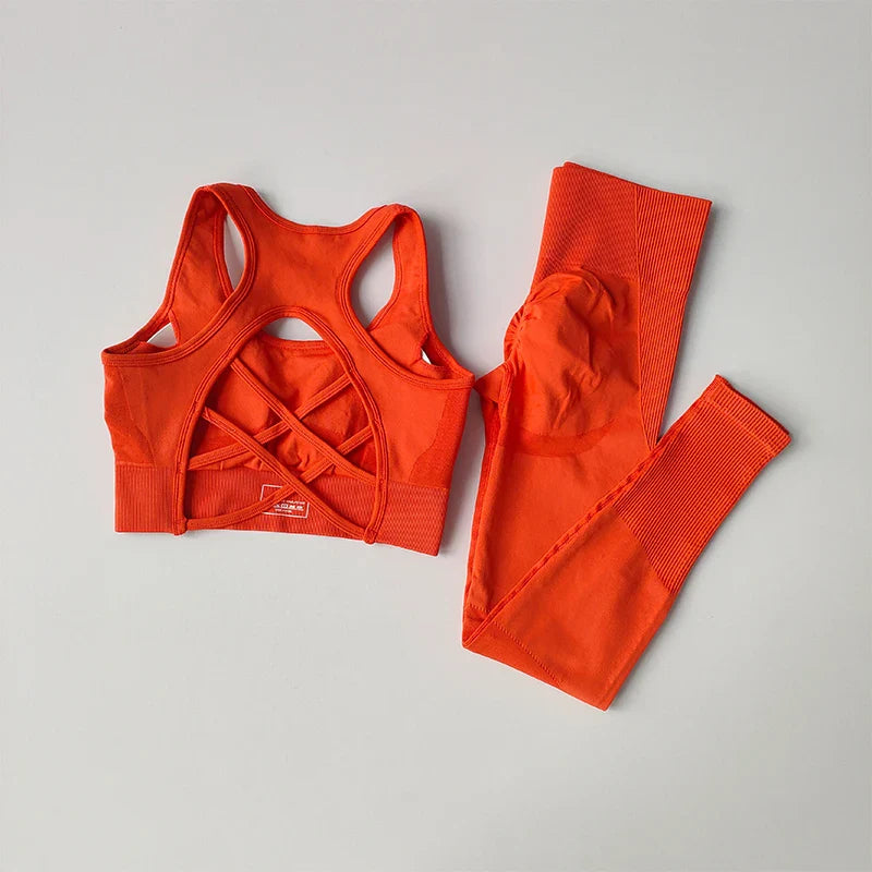 Close-up of the luxurious materials used in the women's sports bra and legging set, highlighting their comfort and seamless design.