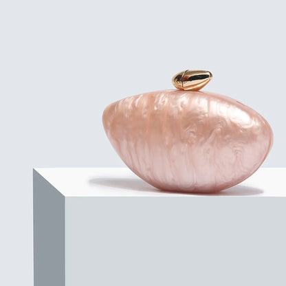 Elegant acrylic evening bag for women, featuring a trendy ellipse design in luxurious finish, perfect for weddings and parties.