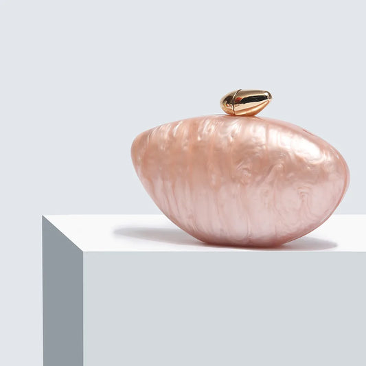 Elegant acrylic evening bag for women, featuring a trendy ellipse design in luxurious finish, perfect for weddings and parties.