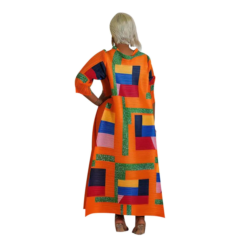 Elegant African plus size O-neck pleated long dress in vibrant colours featuring 3/4 sleeves, showcasing traditional Dashiki style.