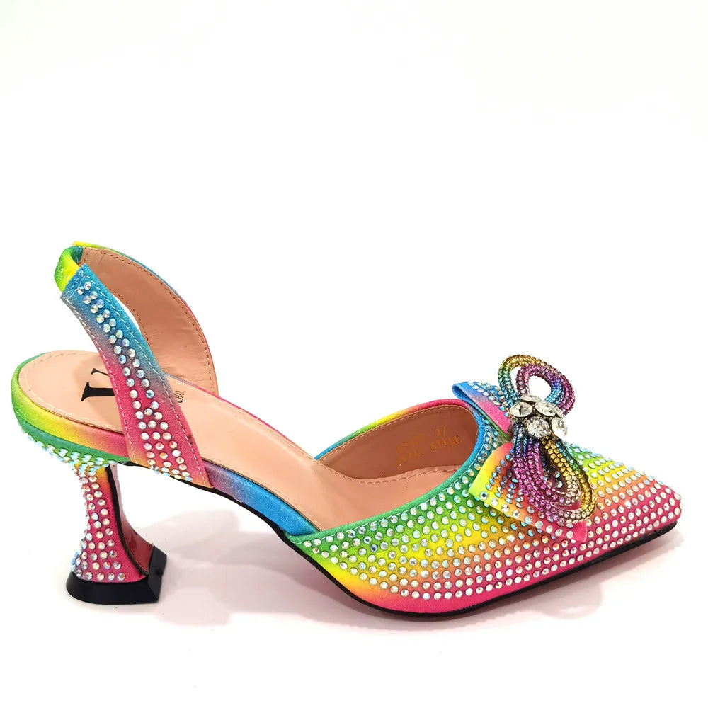 Close-up view of luxurious rhinestone bow on women’s high heels, showcasing exquisite craftsmanship and attention to detail.