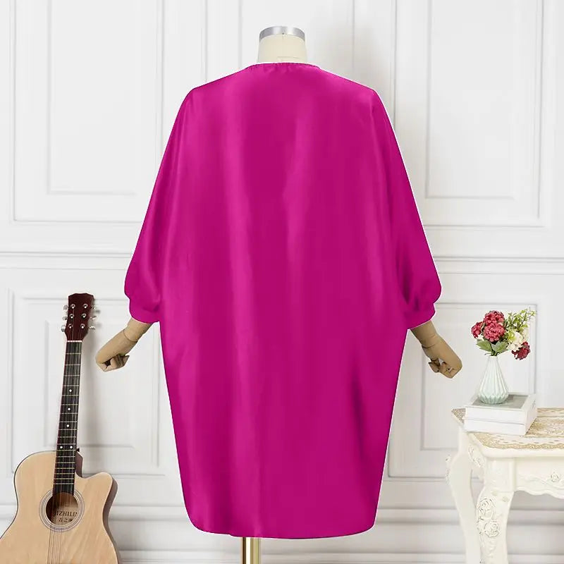 Chic close-up of the elaborate floral pattern on the VONDA Women’s Plus Size 5XL Bohemian Midi Dress, showcasing its unique design and luxurious fabric.