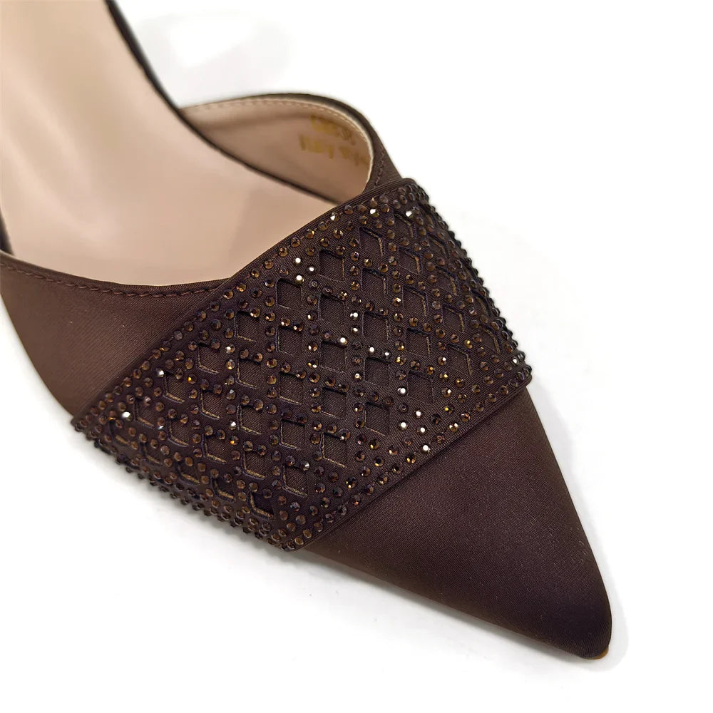 Stylish rhinestone embellished handbag accompanying elegant wine colour heels, designed for fashionable Nigerian women attending special events.