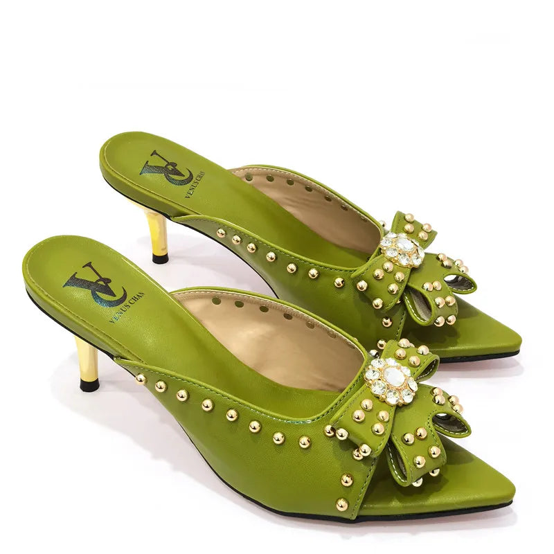 Chic and sophisticated women's footwear displayed with matching bag, ideal for the fashion-conscious lady seeking vibrant accessories.