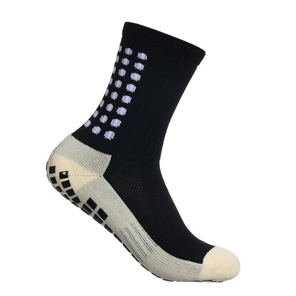 Artistic display of MagiMobo Grip Non-Slip Football Socks for men, highlighting the luxurious nylon material and ergonomic fit designed for athletes.