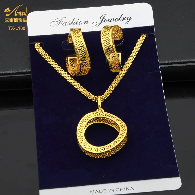 Beautifully arranged 24K gold-plated copper jewelry set, featuring geometric necklace and earrings, designed for stylish women attending formal gatherings.