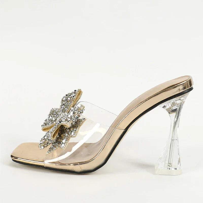 Stylish Liyke Women's Transparent High Heel Sandals showcasing a super high heel with a trendy butterfly-knot accent for a touch of glamour.
