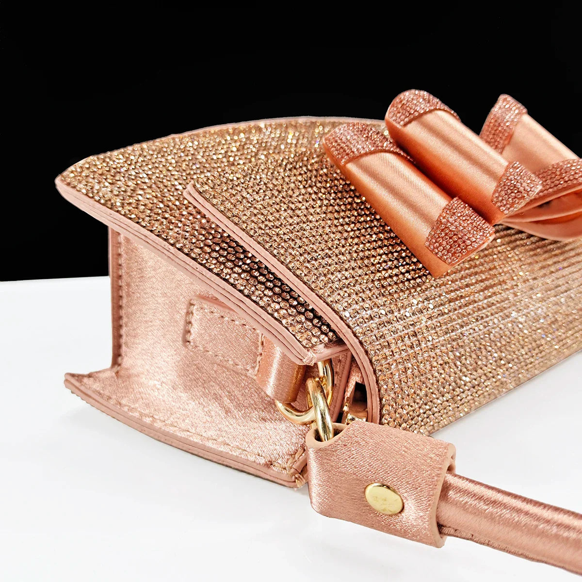 Close-up of elegant pointed toe shoes featuring intricate rhinestone butterfly design, perfect for fashion-forward women attending formal events.