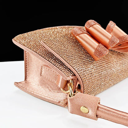 Close-up of elegant pointed toe shoes featuring intricate rhinestone butterfly design, perfect for fashion-forward women attending formal events.