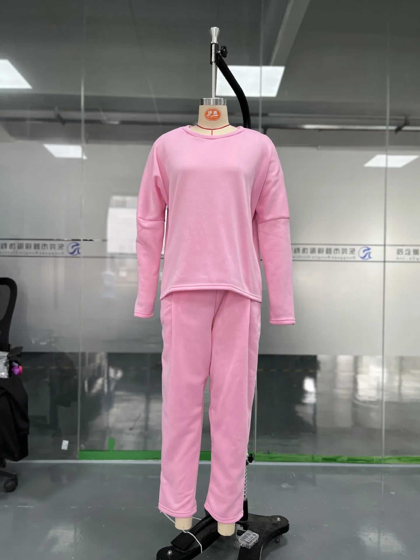 Detail shot of the women's outfit pockets, illustrating the functional design element that enhances the style and practicality of the clothing.