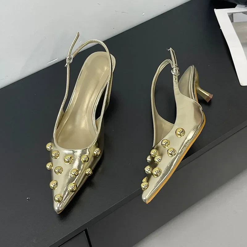 Elegant high heeled sandals for women featuring a fashionable rivet design, pointed toe, and back strap, perfect for summer occasions by Hot Trends Area.