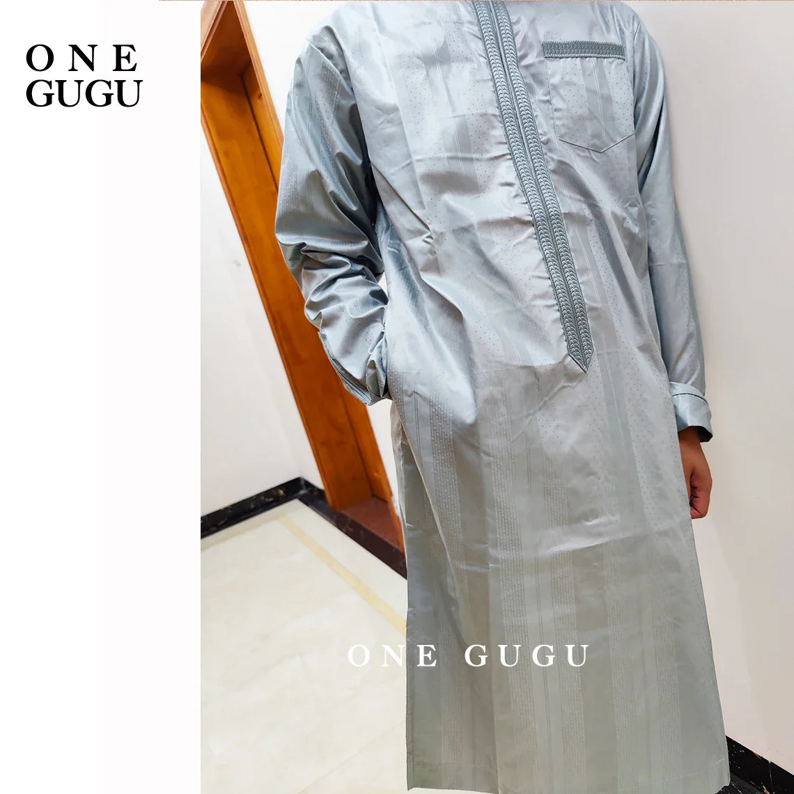 Luxury men's blue cotton shirt and pants set with a traditional Nigerian Dashiki design, perfect for upscale parties and weddings, sizes L-2XL.