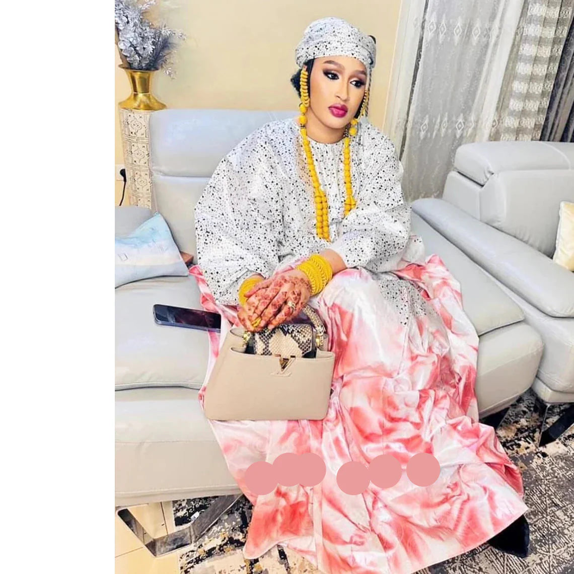 Luxury African Dashiki Bubu Dress in rich blue cotton embellished with intricate embroidery lace, exuding elegance and sophistication.