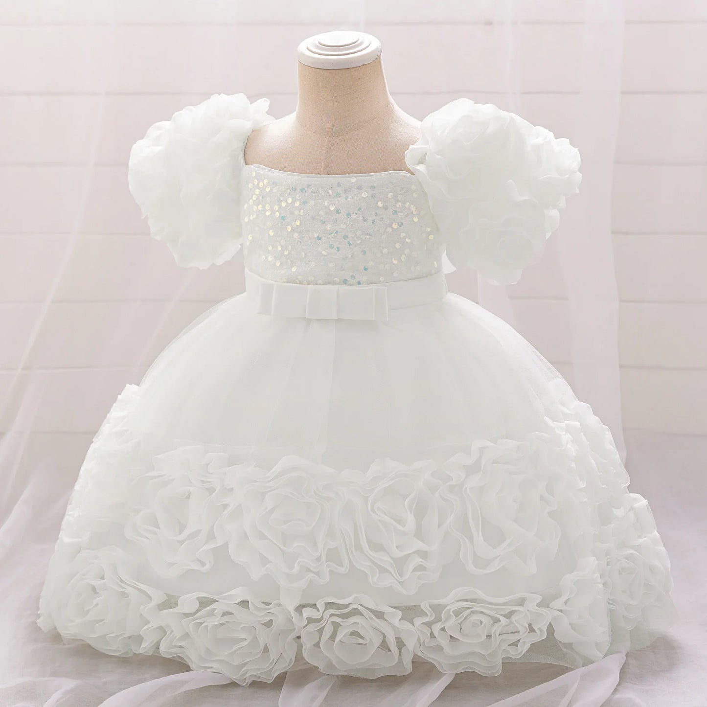 Elegant 3D floral design on a cute tulle gown for girls aged 4-10, ideal for birthdays and weddings.
