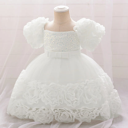 Elegant 3D floral design on a cute tulle gown for girls aged 4-10, ideal for birthdays and weddings.