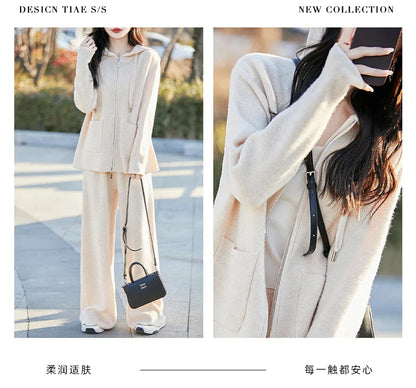 Full-length wide leg pants in a solid colour, offering a comfortable mid-waist fit, exceptionally paired with a luxurious cardigan.