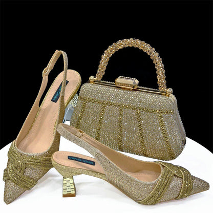 Luxurious handbag matching the Venus Chan champagne high heel shoes, adorned with a stylish metal handle, crafted for women who appreciate elegance and comfort.