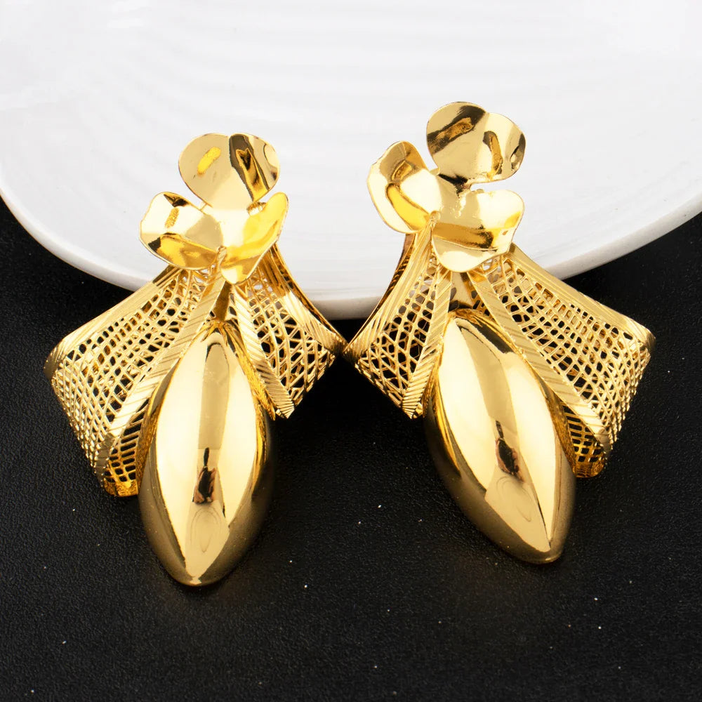 Stunning pair of gold plated earrings matching the bow tie necklace, ideal for enhancing women's fashion jewellery collections.