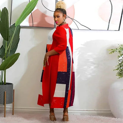 Stylish African Plus Size O-Neck Dress on a model, highlighting the flattering fit and luxurious 3/4 sleeves in rich hues.