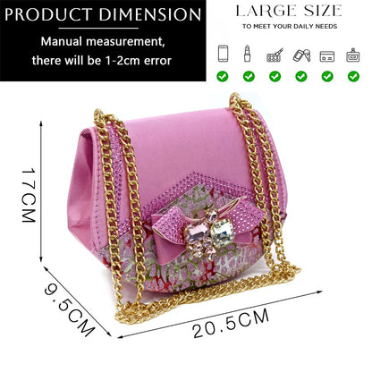 Fashionable women’s handbag featuring a metal handle and rhinestone embellishments, a perfect accessory for upscale events.