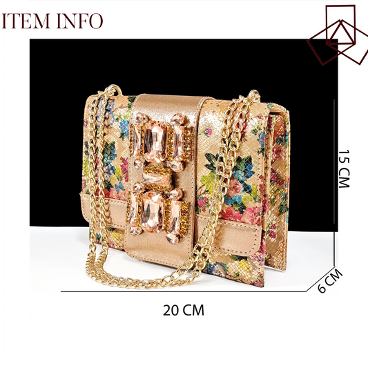 Stylish matching rose gold handbag from QSGFC, designed to complement high heel sandals, featuring intricate metal and rhinestone decorations for a sophisticated look.