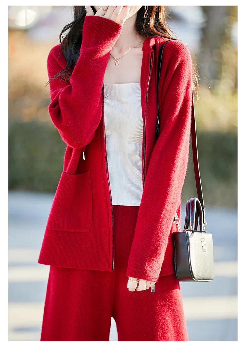 Full outfit display of a stylish women's hooded cardigan paired with wide leg pants, epitomizing luxury and casual sophistication.