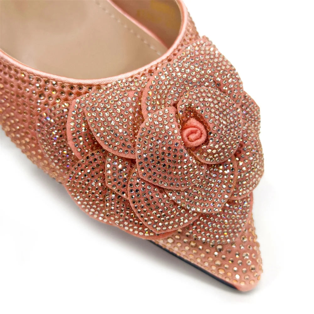 Stylish close-up of the pointed-toe pump in the women's shoe and bag set, showcasing exquisite rhinestone embellishments and floral design for sophisticated elegance.