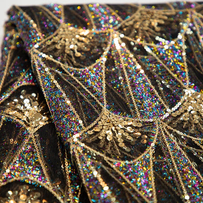 Detailed view of Kalume mesh lace fabric showcasing intricate sequin detailing, ideal for creating stunning evening wear.