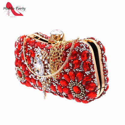 Luxury red peep toe sandals with crystal detailing and buckle strap, ideal for formal occasions.