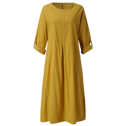 Elegant plus size women's long sleeve solid O-neck summer maxi dress with pockets in A-line silhouette, perfect for casual outings.