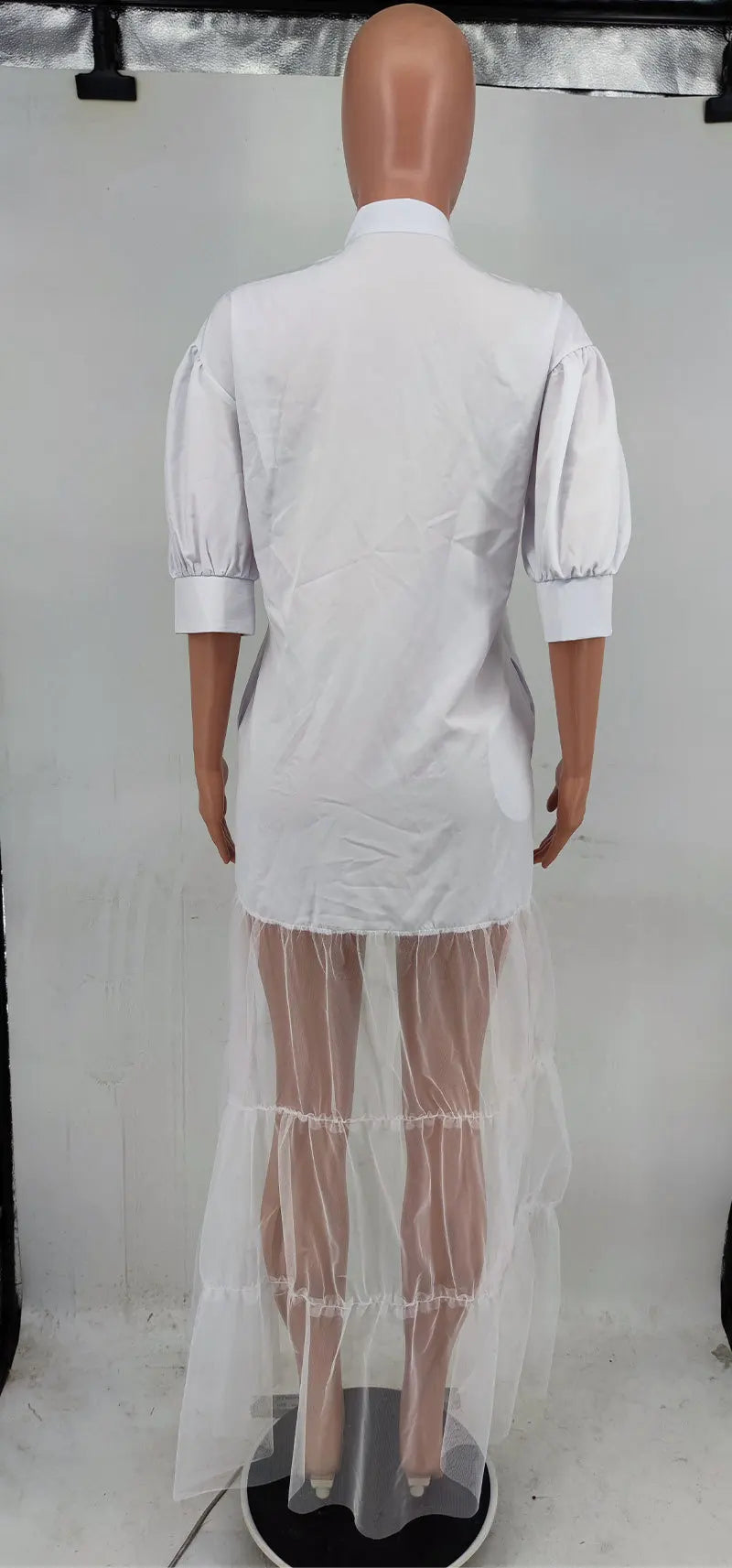 Full view of a women's ankle-length lace shirt dress, exuding elegance suitable for casual outings or formal events.