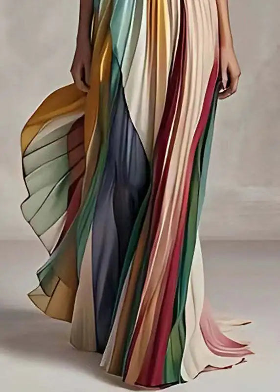 Elegant women's sleeveless asymmetrical maxi dress featuring colourful striped bohemian style, ideal for a luxurious summer look.
