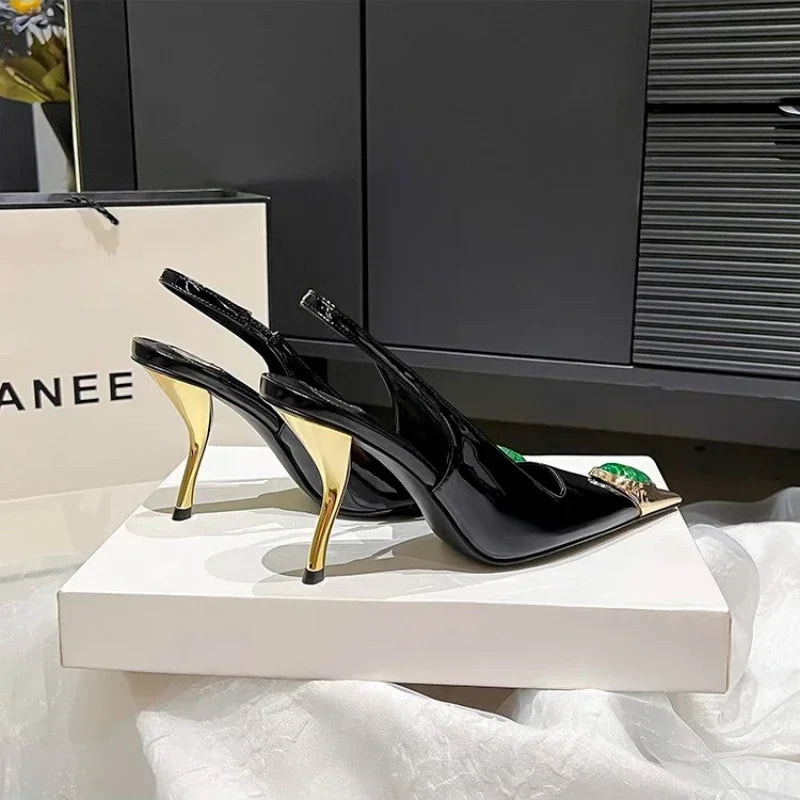 Elegant and fashionable red high heel sandals adorned with fox head jewels, a must-have for trendy women's wardrobes.